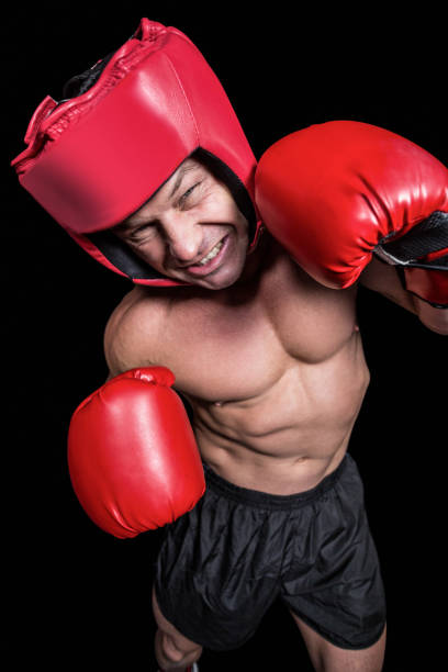 istock High angle view of boxer with headgear and gloves 671053900