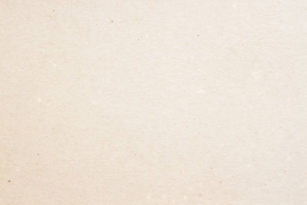 istock Texture of old organic light cream paper, background for design with copy space text or image. Recyclable material, Natural rough, has small inclusions of cellulose 671058630