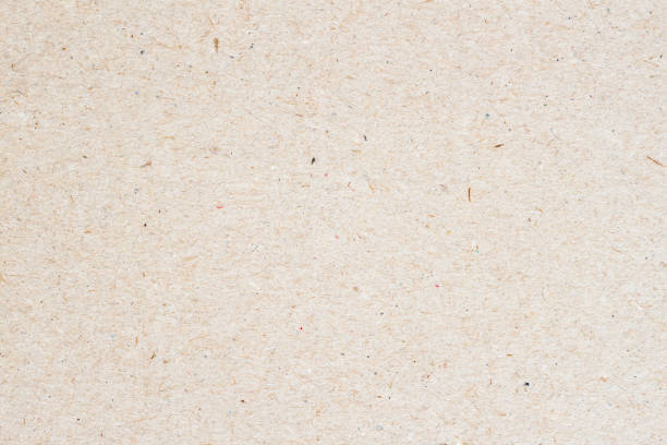 istock Texture of old organic light cream paper, background for design with copy space text or image. Recyclable material, has small inclusions of cellulose 671058762