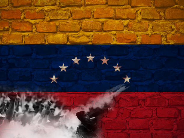 istock 2017 Massive protests in Caracas, Venezuela. Illustrative background. Big crowds gathered in cities  following weeks of violent demonstrations 671062336