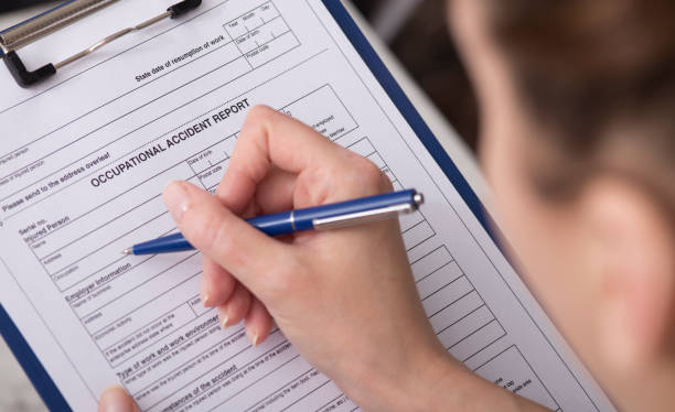 istock Woman filling Accident report 671064984