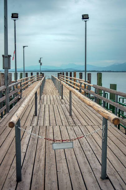 istock Pier for passenger boats at Chiemsee lake 671065694