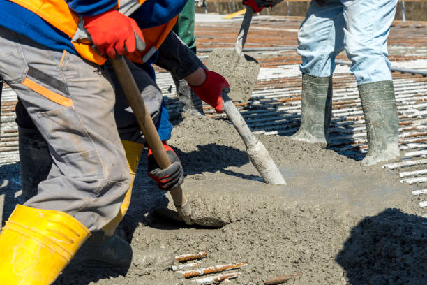 Concrete pouring on the construction site stock photo