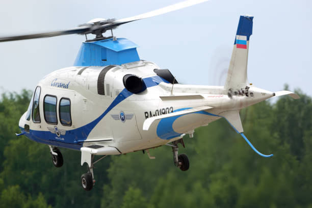 VLADIMIR, RUSSIA - JUNE 2, 2015: Private Agusta A109S Grand helicopter RA-01903 departing Semyazino airfiled. stock photo