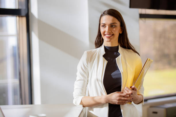 istock Smiling business woman 671080420