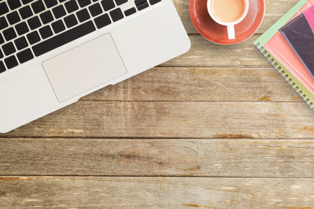 istock Notebooks and coffee on office desk or wood table 671081014