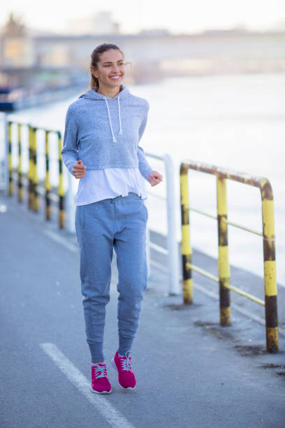 istock Young female running outdoor 671098442