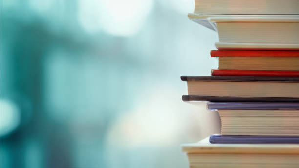 Business and education background Book stack in the library room and blurred bookshelf, business and education background education concept stock pictures, royalty-free photos & images
