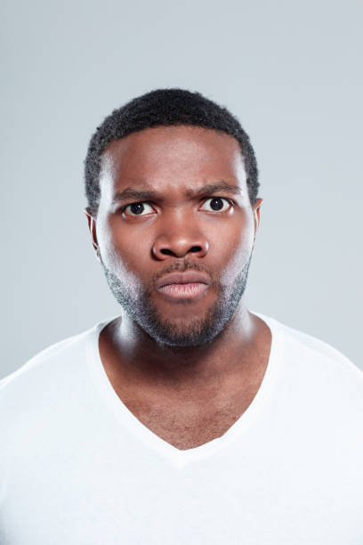 istock Young afro american man looking angry 671104148