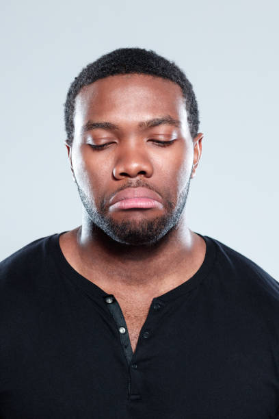 istock Young afro american looking unhappy 671107698