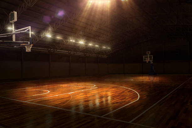istock indoor basketball court with dramatic lighting 671111106