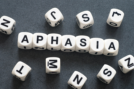 word aphasia on white toy cubes