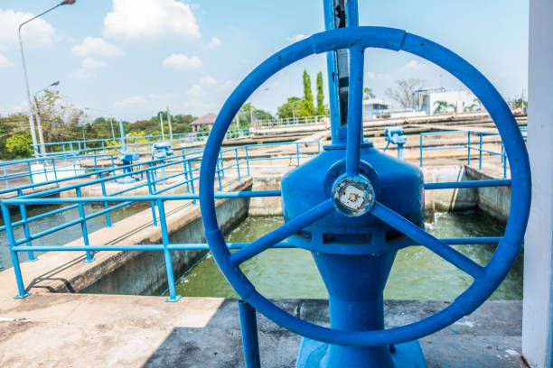 istock Blue valve at water treatment plant 671136604