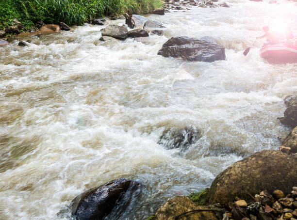 istock A group of men and women are rafting on waterfall 671137638