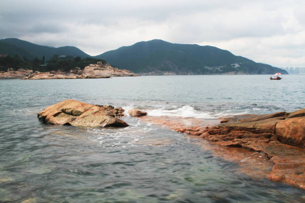istock rocky sea coast  in shek o 671140026