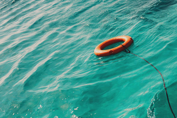 The last chance! Somebody holds a life-saver to avoid drowning.