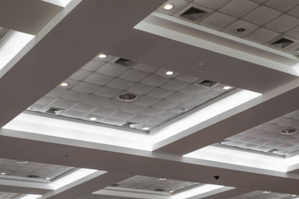 istock ceiling of business office building 671143054