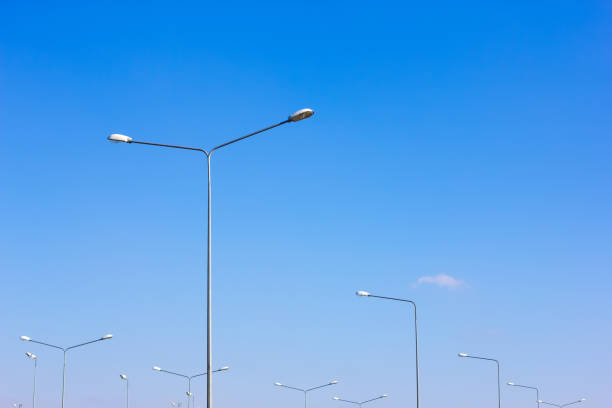 istock Street lights against the sky blue sky 671143252