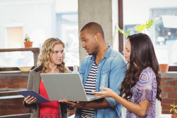 istock Business people discussing in creative office 671155746