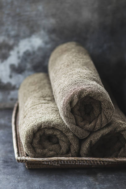 Set of clean towels with grunge background