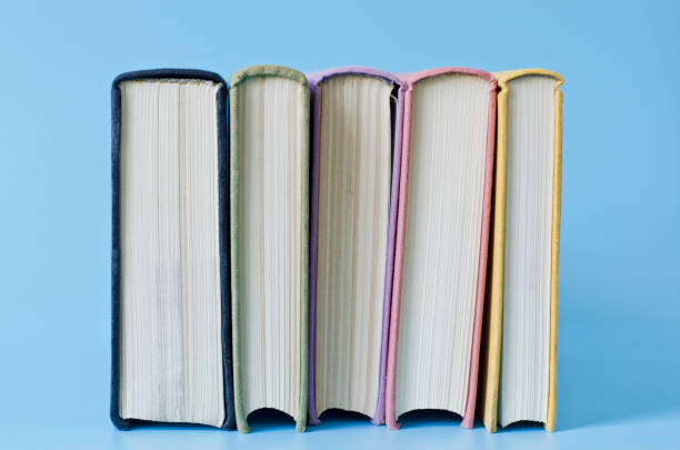 istock a stack of colorful books in library 671156924