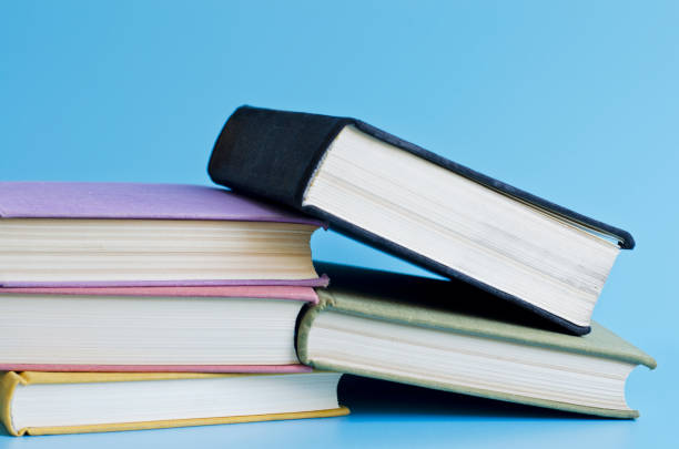 istock a stack of colorful books in library 671157080
