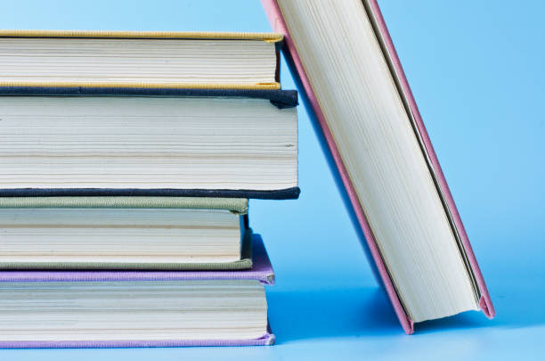 istock a stack of colorful books in library 671157192