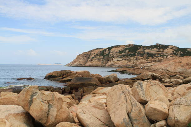 istock rocky sea coast  in shek o 671159818