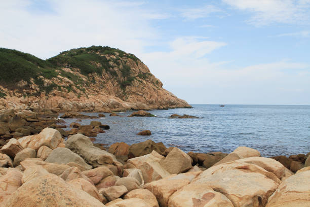 istock rocky sea coast  in shek o 671160670