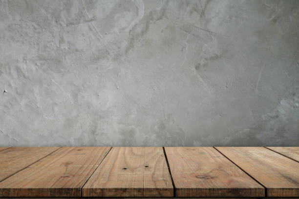 istock Empty top shelves or table wood on concrete wall background.For put product and some thing 671163108