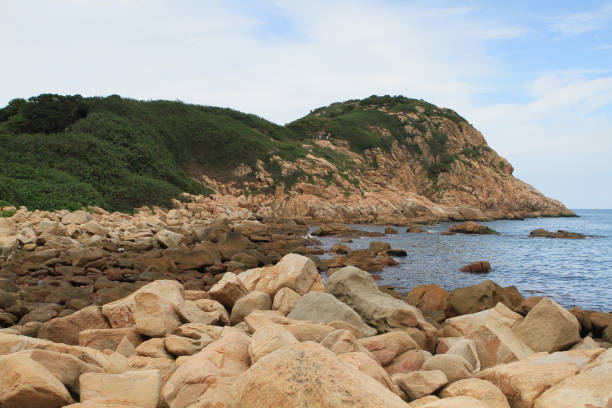 istock rocky sea coast  in shek o 671163334