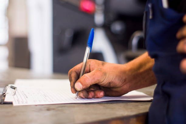 istock mechanic fills with dirty hands leaf diagnostic 671163346