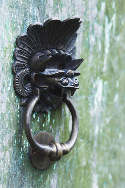 istock Old door knob in dragon shape Bali style 671164036