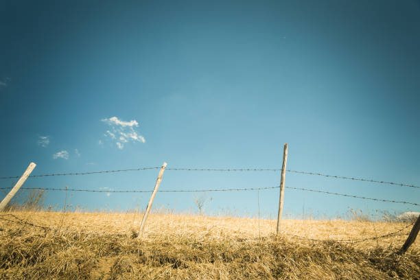 istock Jablanik mountain landscapes. Barbwired fence 671164554