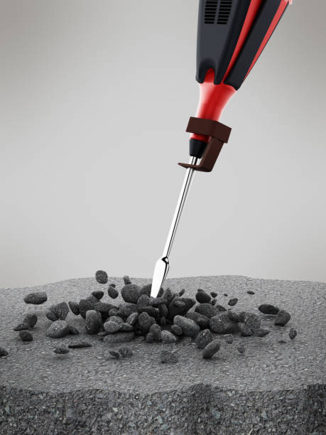 istock Concrete breaker breaking the asphalt 671179070