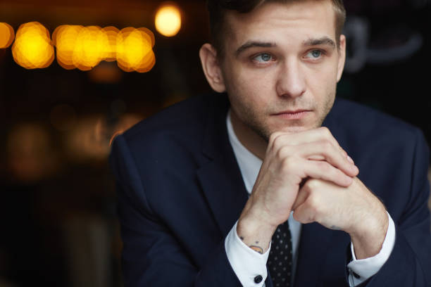 istock Young Pensive Businessman in Cafe 671179576