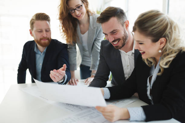 istock Business colleagues working at their workplace in office 671182678