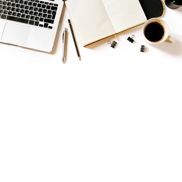 istock Modern minimalistic work place. White office desk table with laptop, coffee cup, clips, notebook, pen and pencil. Top view with copy space, flat lay 671184360