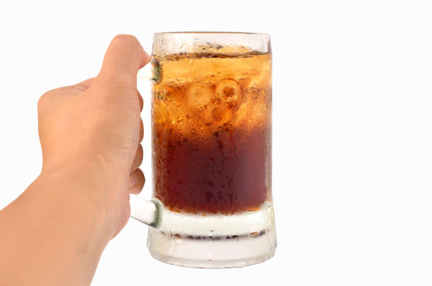 istock Cola glass in hand on white background/clipping paths 671192270