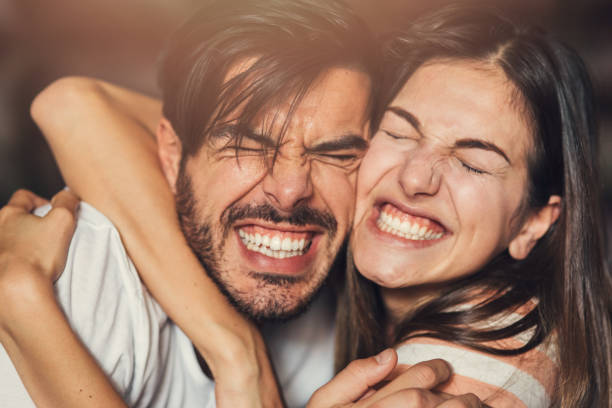 Goofy young couple Happy young couple making faces. clingy girlfriend stock pictures, royalty-free photos & images