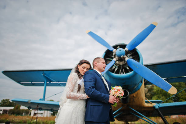 istock wedding couple background plane on airport 671199518