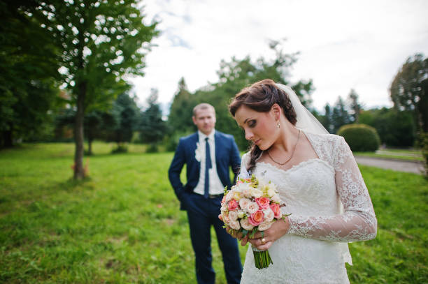 istock lovely newlywed at nature park square 671199970