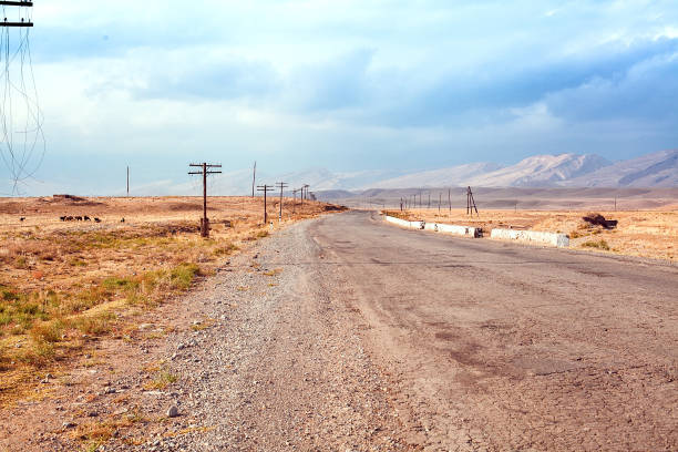 istock Gravel road in the steppe 671200522