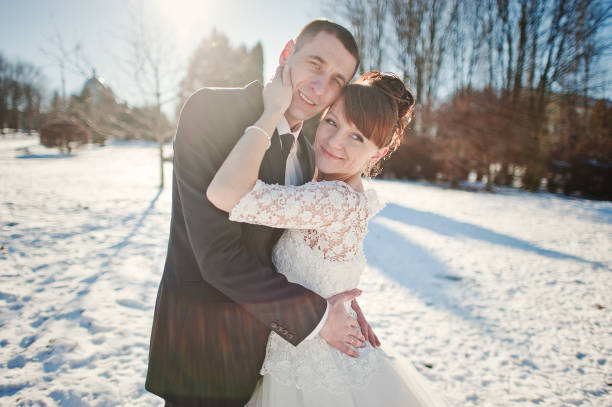 istock wedding couple at the winter day 671210980