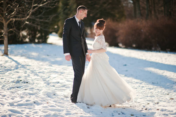 istock wedding couple at the winter day 671211066