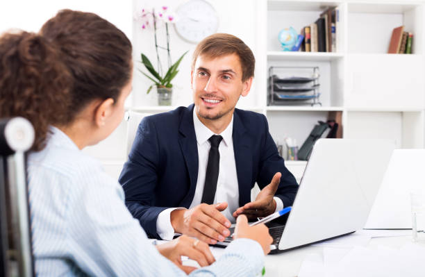 istock Business male assistant wearing formalwear using laptop 671211546