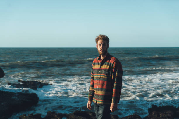istock Man standing near the sea in Morocco 671212026