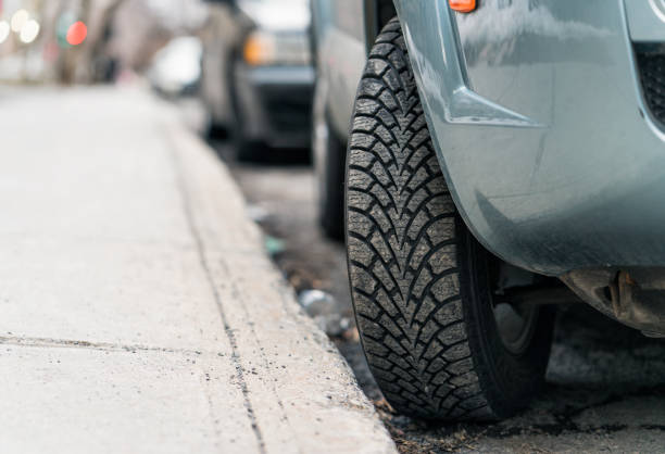 Tire turned into the curb - parking on a hill