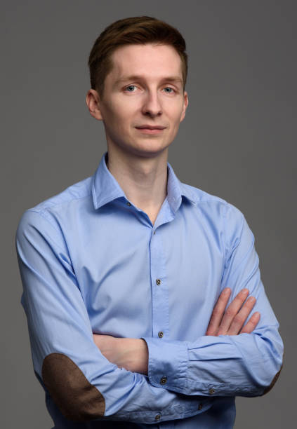 istock portrait of a confident young man 671221912