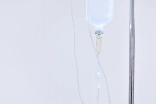 istock Infusion bottle with IV solution in hospital 671228778